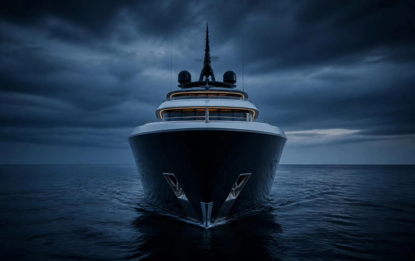 Bow of a superyacht in dark waters